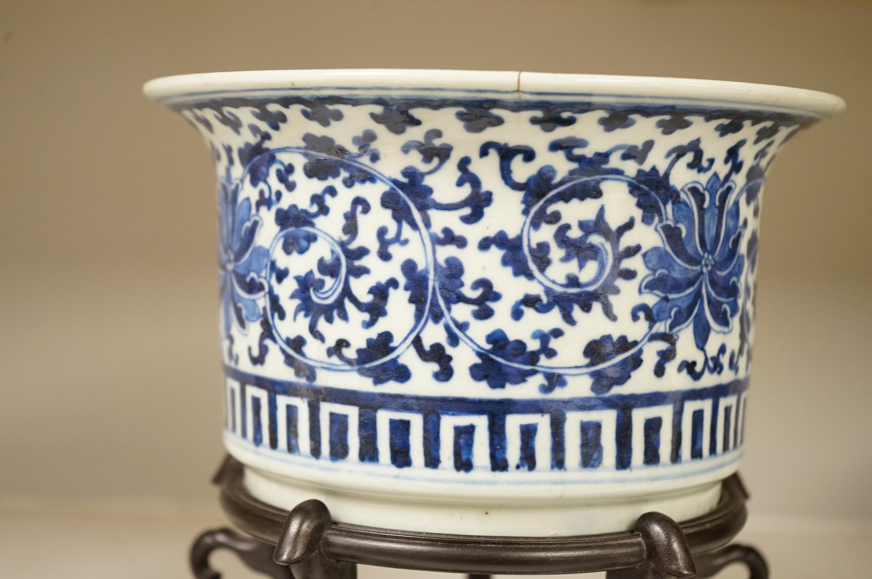 A Chinese blue and white bowl, on stand, 23cm high. Condition - fair